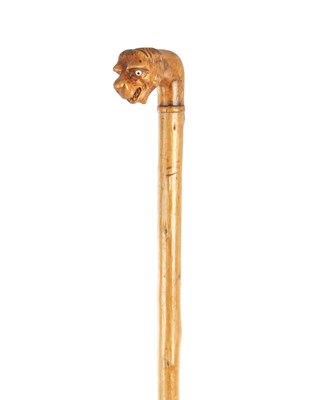 Lot 625 - A 19TH CENTURY CARVED WOOD HANDLE WALKING STICK.