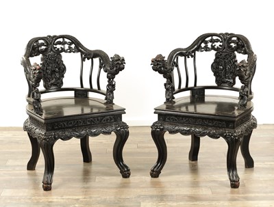Lot 161 - A PAIR OF 19TH CENTURY CHINESE CARVED HARDWOOD ARMCHAIRS