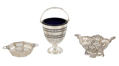 Lot 408 - A COLLECTION OF THREE PIERCED SILVER AND SILVER PLATED BASKETS