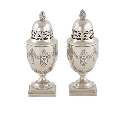 Lot 499 - A PAIR OF GEORGE V URN SHAPED ADAM STYLE SILVER SUGAR CASTERS