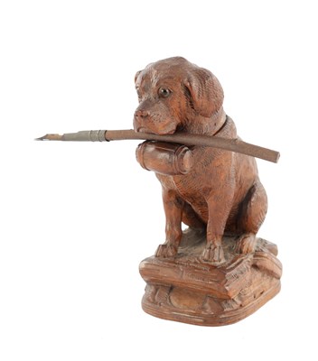Lot 1091 - A GOOD 19TH CENTURY BLACK FOREST CARVED WOOD DOG INKWELL