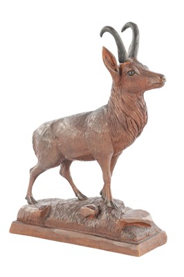 Lot 1086 - A LATE 19TH CENTURY CARVED WOOD BLACK FOREST ANIMALIER SCULPTURE