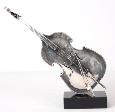 Lot 185 - A SOLID SILVER SCULPTURE FORMED AS A DOUBLE...