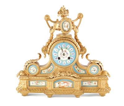 Lot 1607 - A LATE 19TH CENTURY FRENCH GILT PORCELAIN PANELLED MANTEL CLOCK