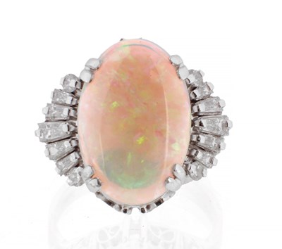 Lot 577 - A LARGE OPEL AND DIAMOND PLATINUM RING