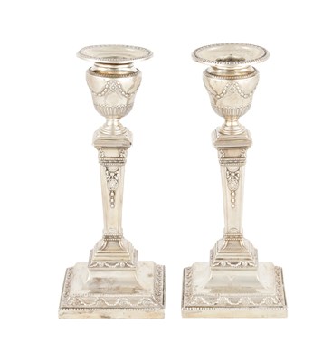 Lot 289 - A PAIR OF LATE 19TH CENTURY ADAMS STYLE SILVER CANDLESTICKS