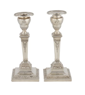 Lot 290 - A PAIR OF ADAMS STYLE SILVER CANDLESTICKS