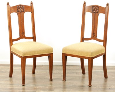 Lot 1266 - A PAIR OF LIBERTY STYLE OAK ARTS AND CRAFTS HALL CHAIRS