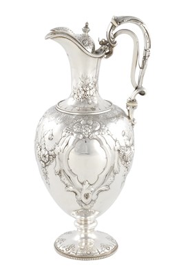 Lot 382 - A LARGE FINE VICTORIAN EMBOSSED SILVER EWER