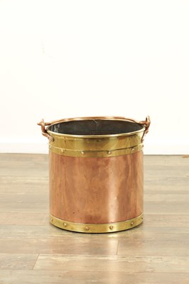 Lot 852 - A LATE 19TH CENTURY RIVETED BRASS BOUND COPPER COAL BUCKET
