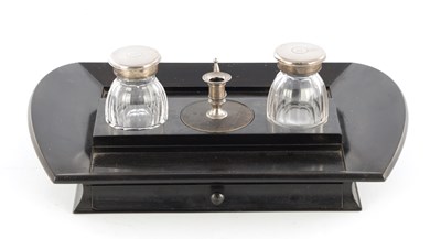 Lot 947 - A LATE GEORGIAN EBONY VENEERED DOUBLE SIDED DESK STAND
