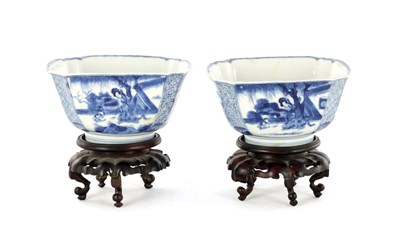 Lot 200 - A PAIR OF CHINESE KANGXI BLUE AND WHITE BOWLS ON STANDS
