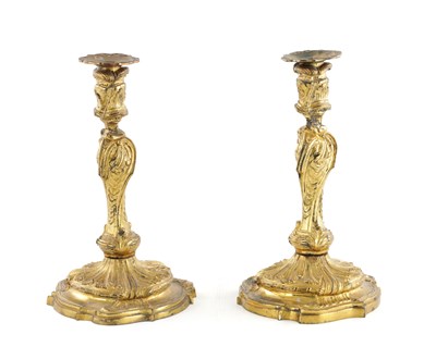 Lot 847 - A PAIR OF 18TH CENTURY FRENCH ROCOCO CAST GILT ORMOLU CANDLESTICKS