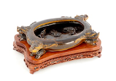 Lot 153 - A FINE AND UNUSUAL CHINESE CARVED TIGER'S EYE BRUSH POT/WASHER