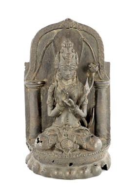 Lot 269 - AN EARLY CHINESE TIBETAN BRONZE FIGURAL SCULPTURE