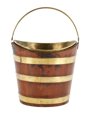 Lot 1337 - AN USUALLY SMALL LATE GEORGIAN BRASS BOUND MAHOGANY OYSTER PALE