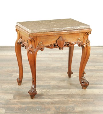 Lot 1332 - A 19TH CENTURY CARVED PINE AND FOSSIL MARBLE TOPPED PIER TABLE