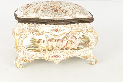 Lot 78 - A LATE 19TH CENTURY ITALIAN CAPODIMONTE GILT METAL MOUNTED PORCELAIN TABLE JEWELLERY CASKET