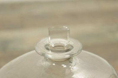 Lot 22 - A SET OF SIX GEORGIAN CLEAR GLASS BOTTLES
