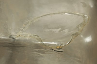 Lot 22 - A SET OF SIX GEORGIAN CLEAR GLASS BOTTLES