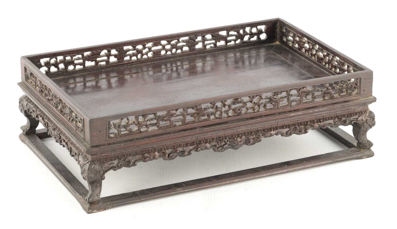 Lot 121 - A FINELY CARVED 18TH CENTURY CHINESE HARDWOOD TRAY POSSIBLY ZITAN