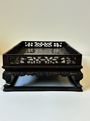 Lot 121 - A FINELY CARVED 18TH CENTURY CHINESE HARDWOOD TRAY POSSIBLY ZITAN