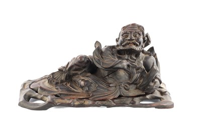 Lot 277 - A 19TH CENTURY CHINESE CARVED HARDWOOD FIGURAL SCULPTURE