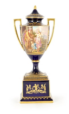 Lot 80 - A 19TH CENTURY VIENNA PORCELAIN TWO HANDLED LIDDED URN SHAPED VASE ON PEDESTAL