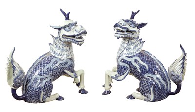 Lot 276 - A PAIR OF CHINESE BLUE AND WHITE PORCELAIN MYTHICAL QILINS