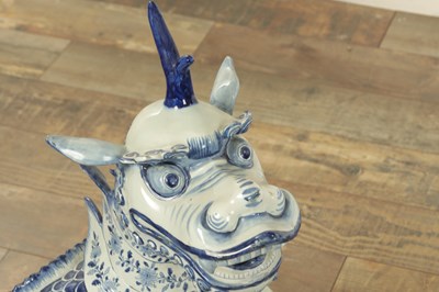 Lot 43 - A PAIR OF DELFT BLUE AND WHITE PORCELAIN MYTHICAL QILINS