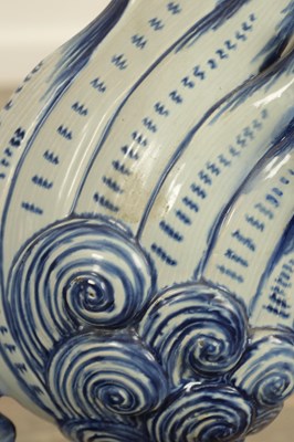 Lot 43 - A PAIR OF DELFT BLUE AND WHITE PORCELAIN MYTHICAL QILINS