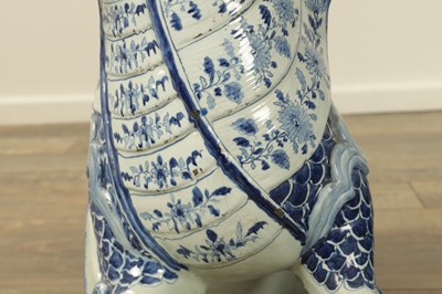 Lot 43 - A PAIR OF DELFT BLUE AND WHITE PORCELAIN MYTHICAL QILINS