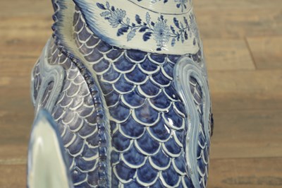 Lot 43 - A PAIR OF DELFT BLUE AND WHITE PORCELAIN MYTHICAL QILINS