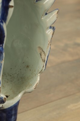 Lot 43 - A PAIR OF DELFT BLUE AND WHITE PORCELAIN MYTHICAL QILINS