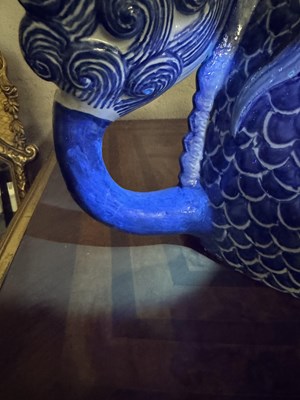Lot 43 - A PAIR OF DELFT BLUE AND WHITE PORCELAIN MYTHICAL QILINS