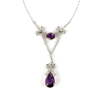 Lot 603 - AN EDWARDIAN PLATINUM AMETHYST & DIAMOND PENDANT NECKLACE
