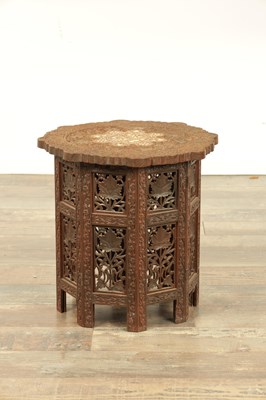 Lot 249 - A 19TH CENTURY INDIAN CARVED HARDWOOD FOLDING OCCASIONAL TABLE