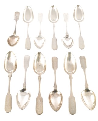 Lot 387 - A SET OF TWELVE PROVINCIAL SCOTTISH SILVER FIDDLEBACK TABLE SPOONS