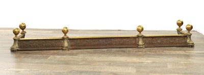 Lot 762 - A LATE 19TH CENTURY CAST IRON AND BRASS AESTHETIC PERIOD HEARTH FENDER