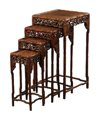 Lot 142 - A GOOD SET OF FOUR 19TH CENTURY CHINESE NEST OF TABLES