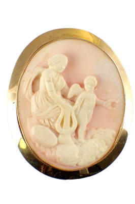 Lot 530 - A VICTORIAN 9CT GOLD MOUNTED CORAL CAMEO BROOCH