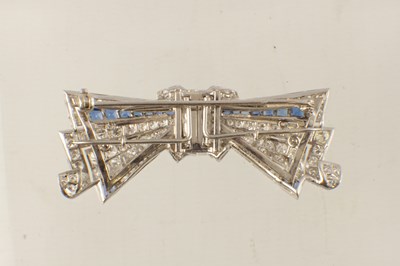 Lot 598 - AN ART DECO 18CT GOLD AND DIAMOND BOW BROOCH