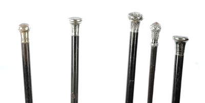 Lot 616 - A SELECTION OF FOUR FRENCH SILVER TOPPED WALKING STICKS AND A WHIP