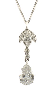 Lot 600 - A PLATINUM AND DIAMOND PEAR-SHAPED PENDANT NECKLACE