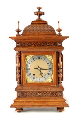 Lot 1714 - A LATE 19TH CENTURY OAK W&H QUARTER STRIKING MANTEL CLOCK