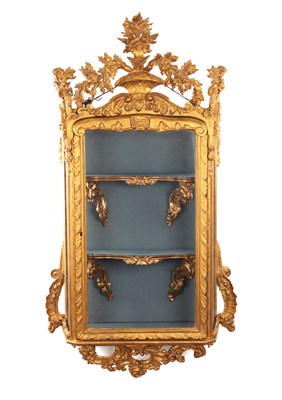 Lot 1345 - A 19TH CENTURY ITALIAN CARVED GILTWOOD HANGING DISPLAY CABINET