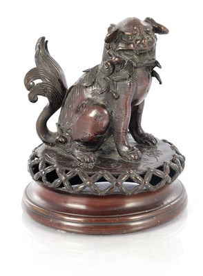Lot 439 - A JAPANESE MEIJI PERIOD BRONZE SCULPTURE OF A FOO DOG