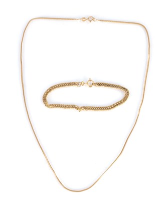 Lot 113 - A 9CT YELLOW GOLD FRANCO CHAIN NECKLACE AND A 9CT GOLD CURB CHAIN BRACELET