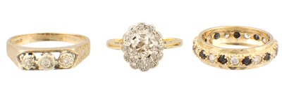 Lot 220 - A COLLECTION OF THREE LADIES GOLD AND DIAMOND RINGS