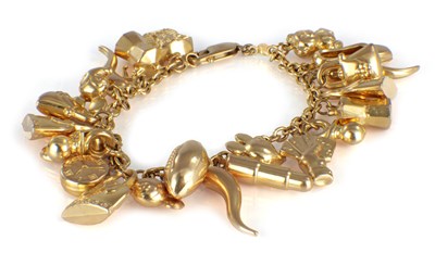 Lot 171 - A 9CT YELLOW GOLD CHARM BRACELET